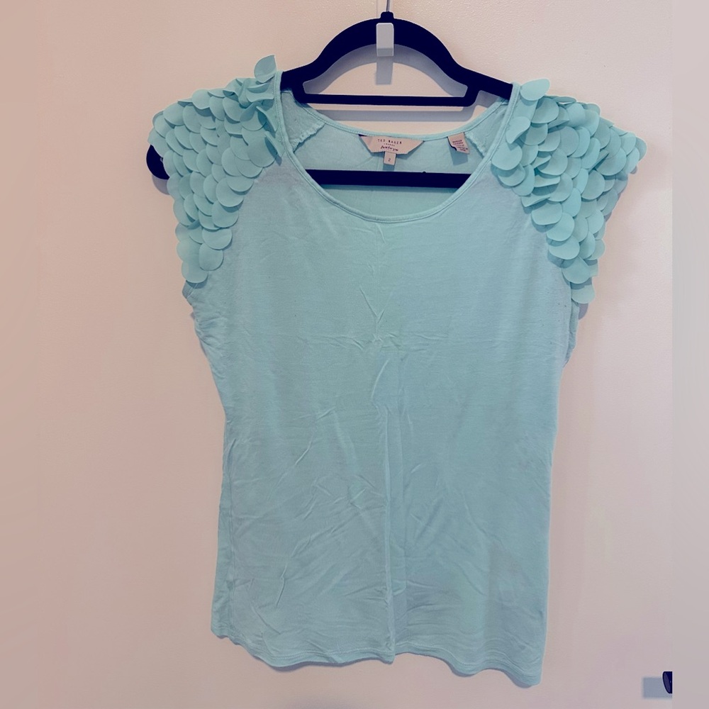 Ted Baker light green jersey top with scalloped detailing on cap sleeves